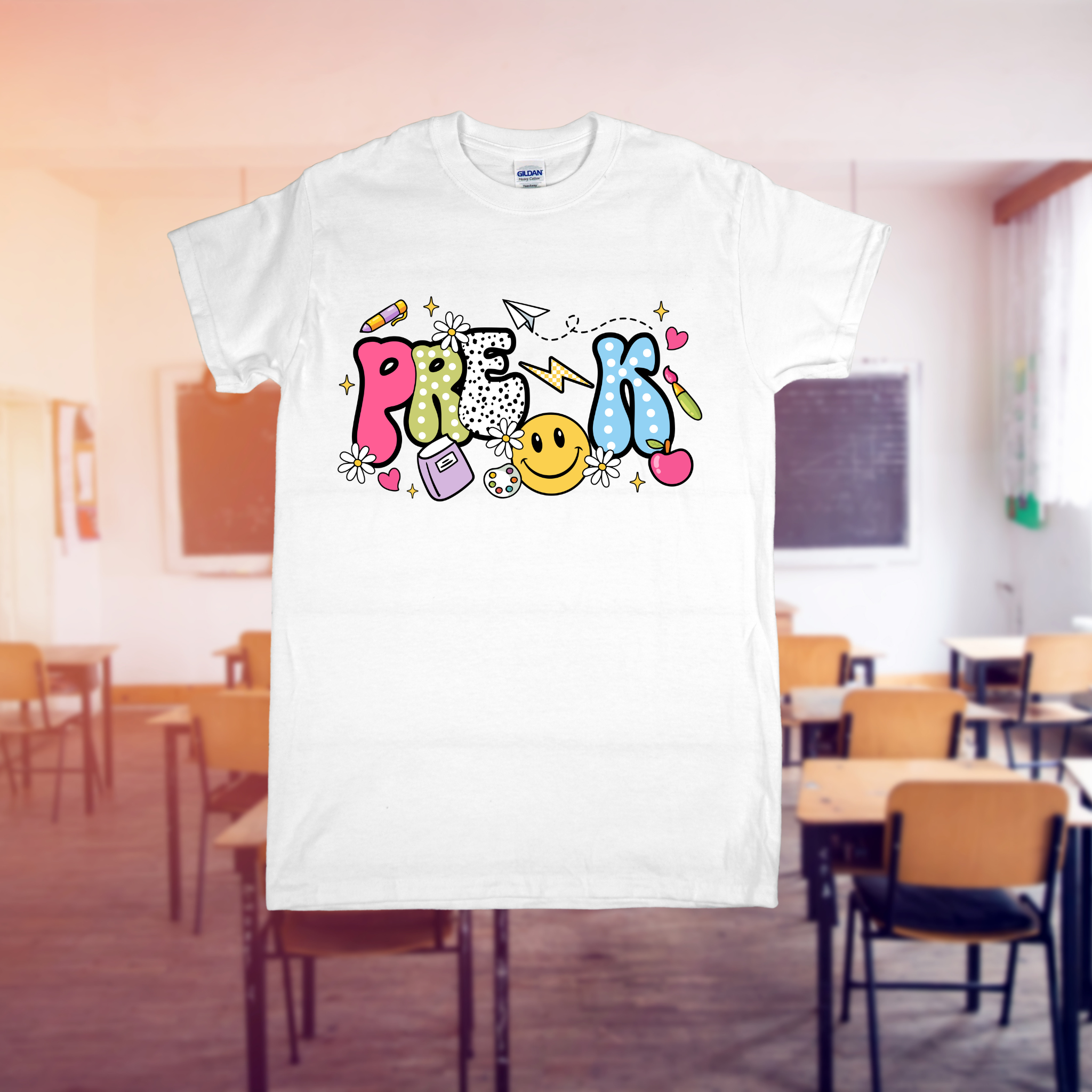 White t-shirt with colorful graphic design in a classroom setting