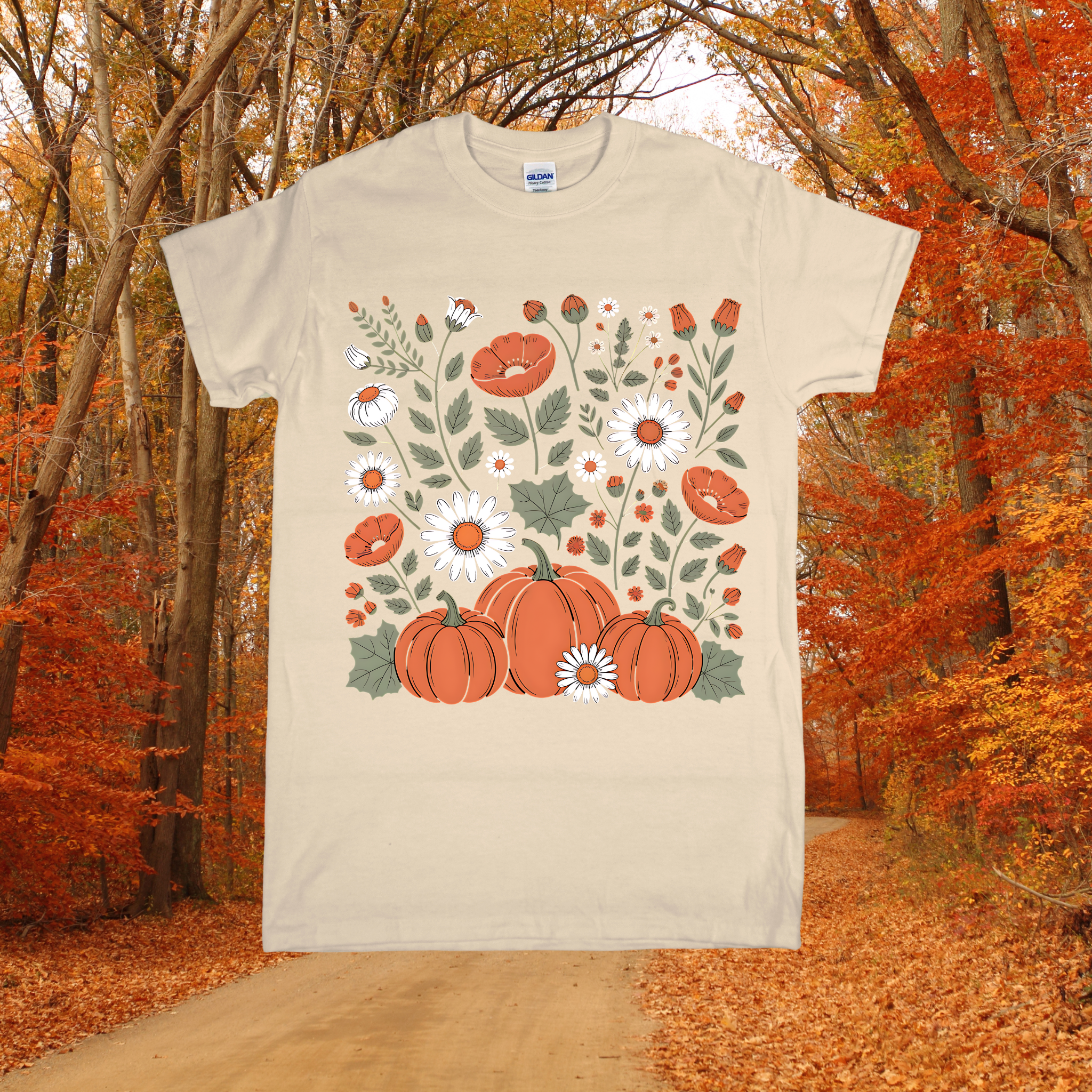 Beige t-shirt with pumpkins and floral design in an autumn forest setting
