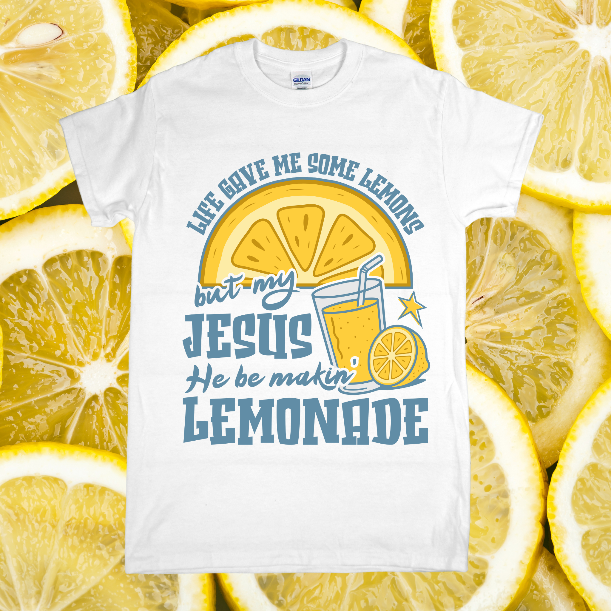White t-shirt with lemon-themed design and text on a background of lemon slices