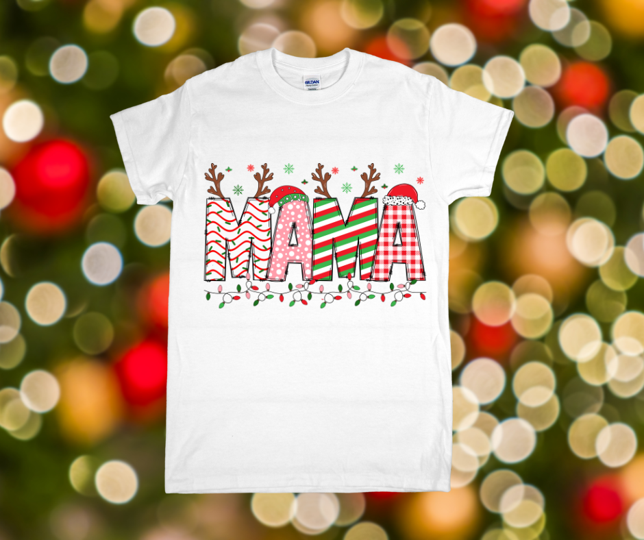 White t-shirt with 'MAMA' design featuring reindeer antlers on a festive background