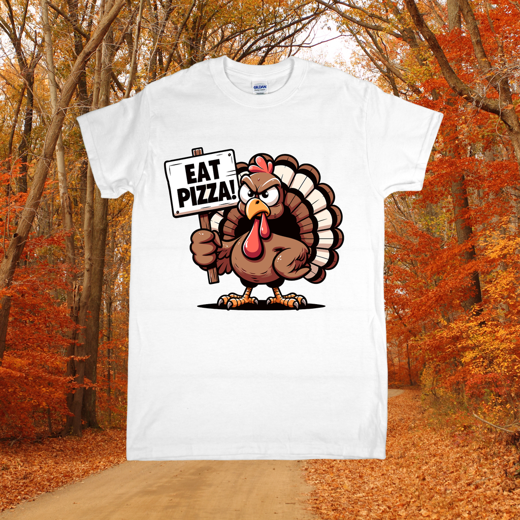 White t-shirt with a turkey holding a 'Eat Pizza!' sign in an autumn forest setting