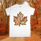 White t-shirt with a plaid leaf design in an autumn forest setting