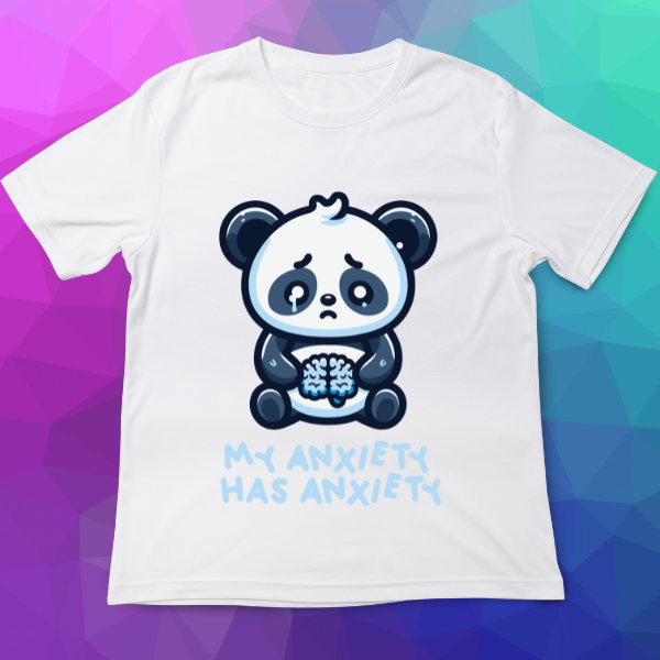 White t-shirt with a panda graphic and text 'My Anxiety Has Anxiety' on a colorful geometric background