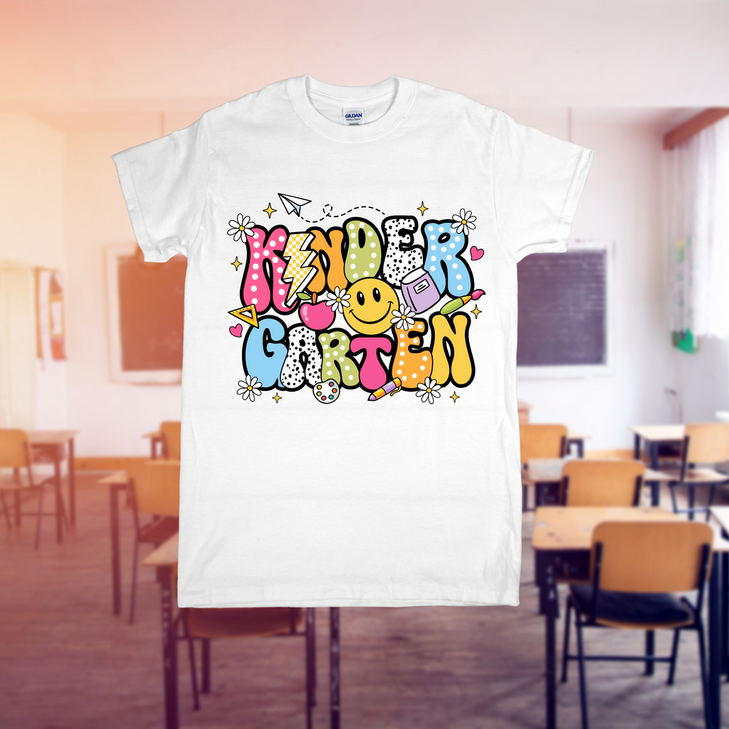 White t-shirt with 'Kindergarten' design in a classroom setting