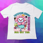 White t-shirt with a colorful design featuring a flower and text on a multicolored geometric background