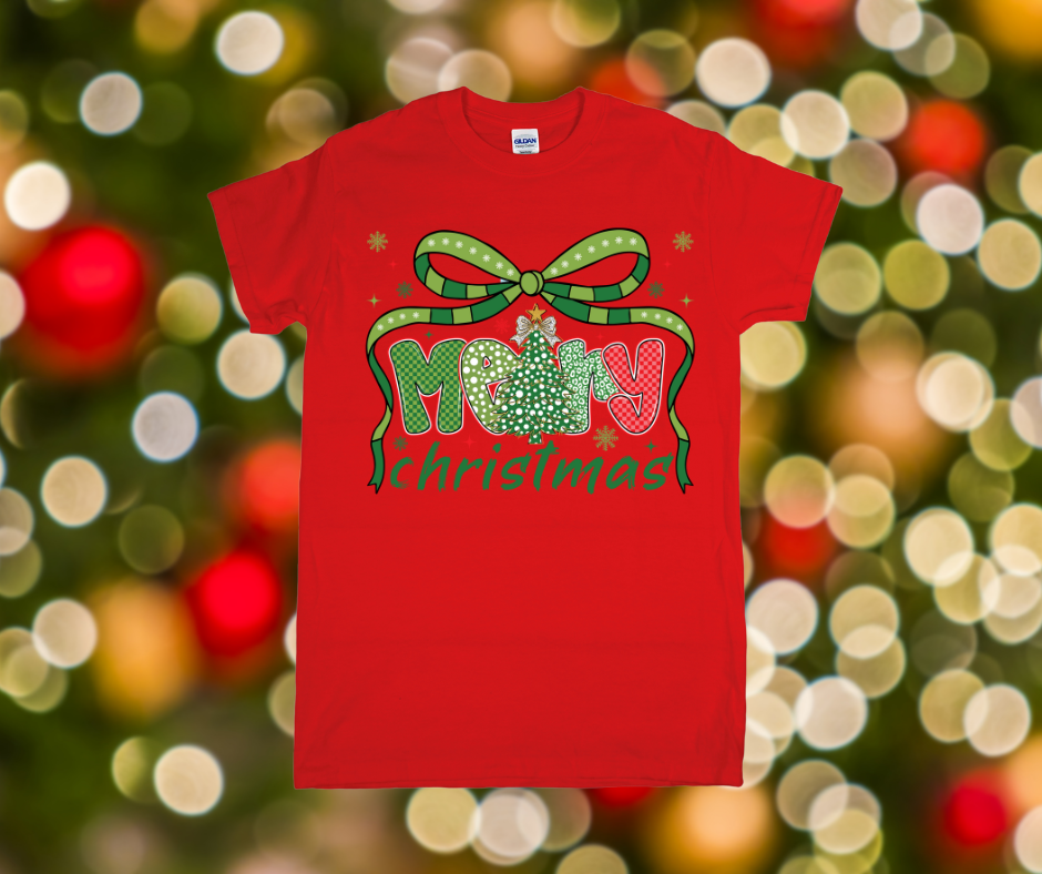 Red t-shirt with Christmas design on a blurred festive background