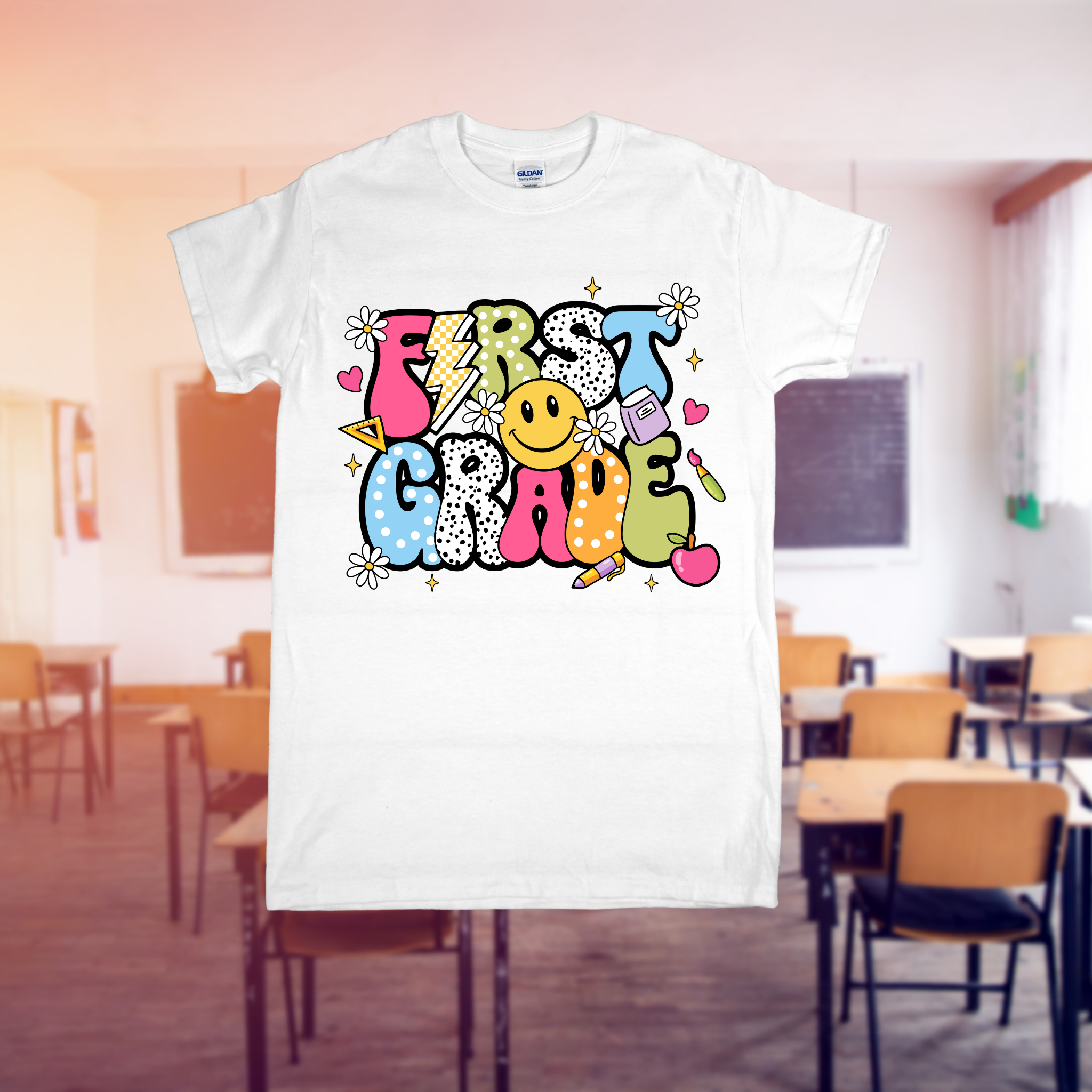 White t-shirt with 'First Grade' design in a classroom setting