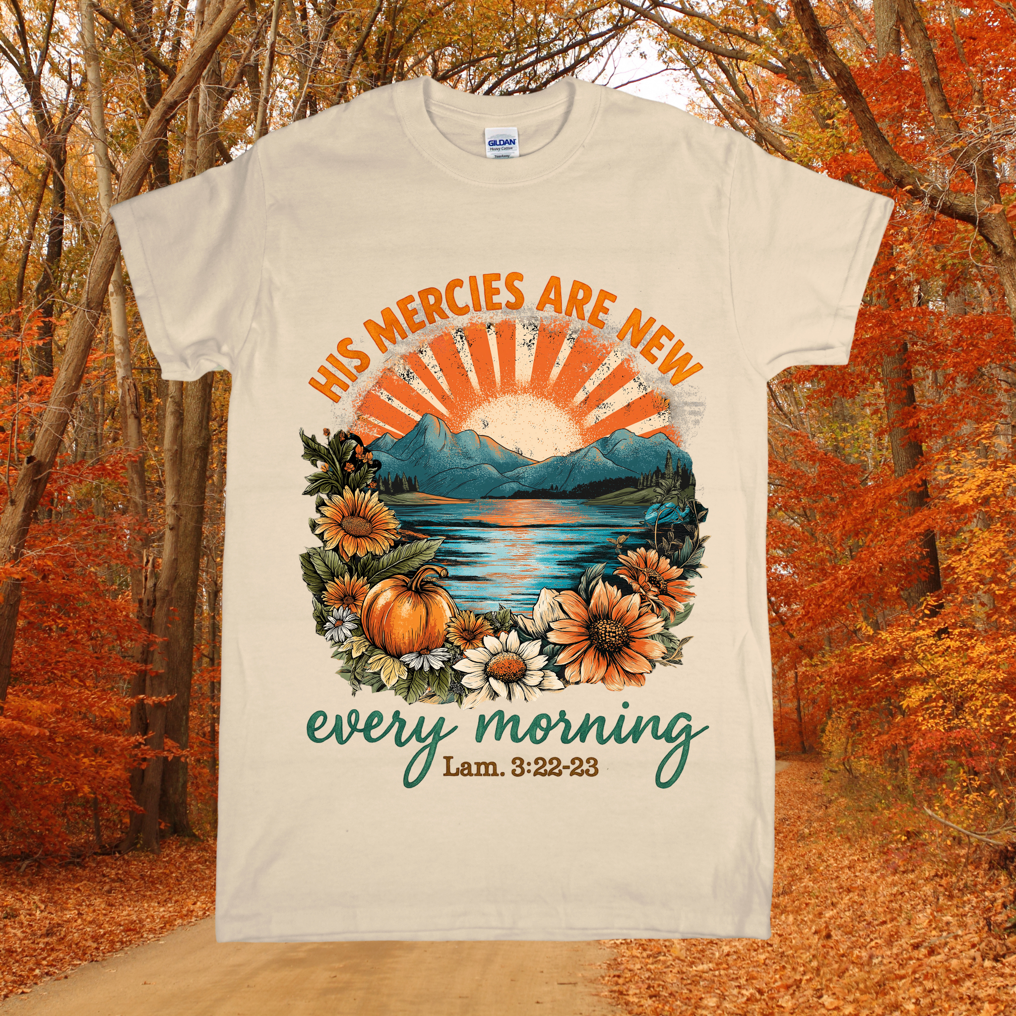 T-shirt with nature-themed design and text in an autumn setting
