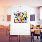 White t-shirt with colorful text design in a classroom setting