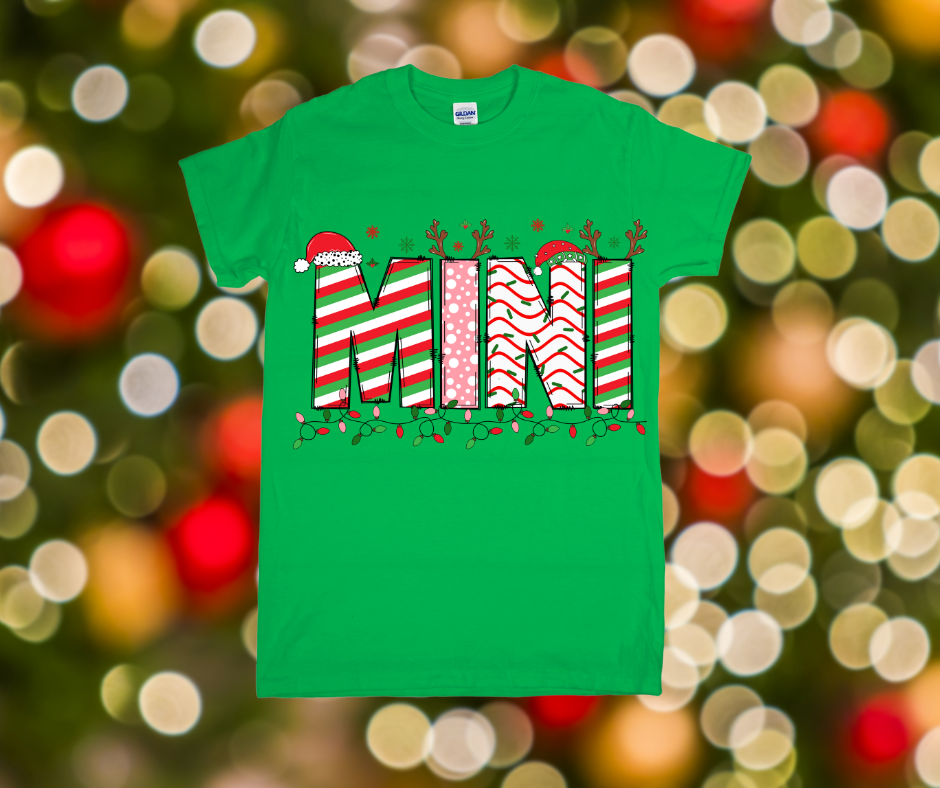 Green t-shirt with 'MINI' in candy cane design on a festive background