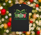 Black t-shirt with 'Merry Christmas' design on a festive background