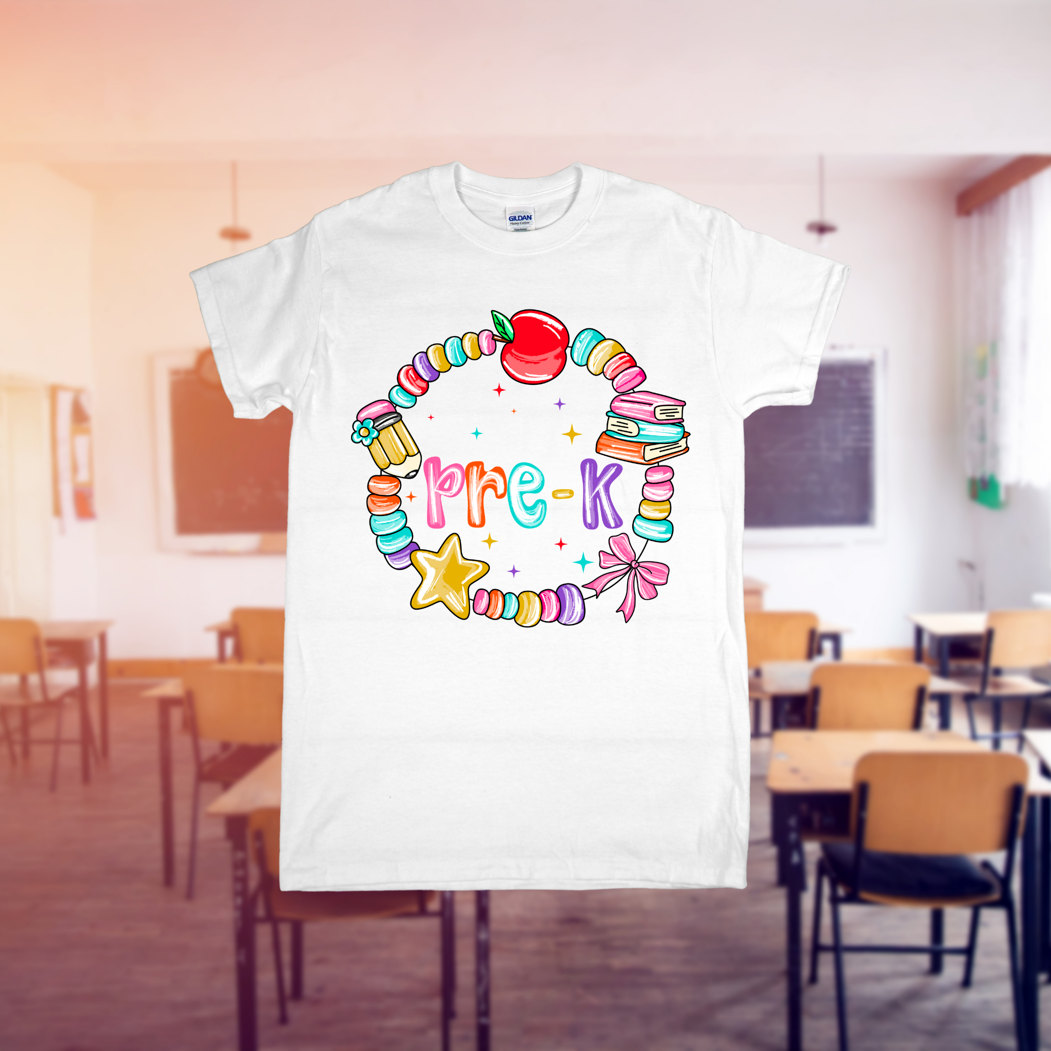White t-shirt with colorful 'pre-k' design in a classroom setting