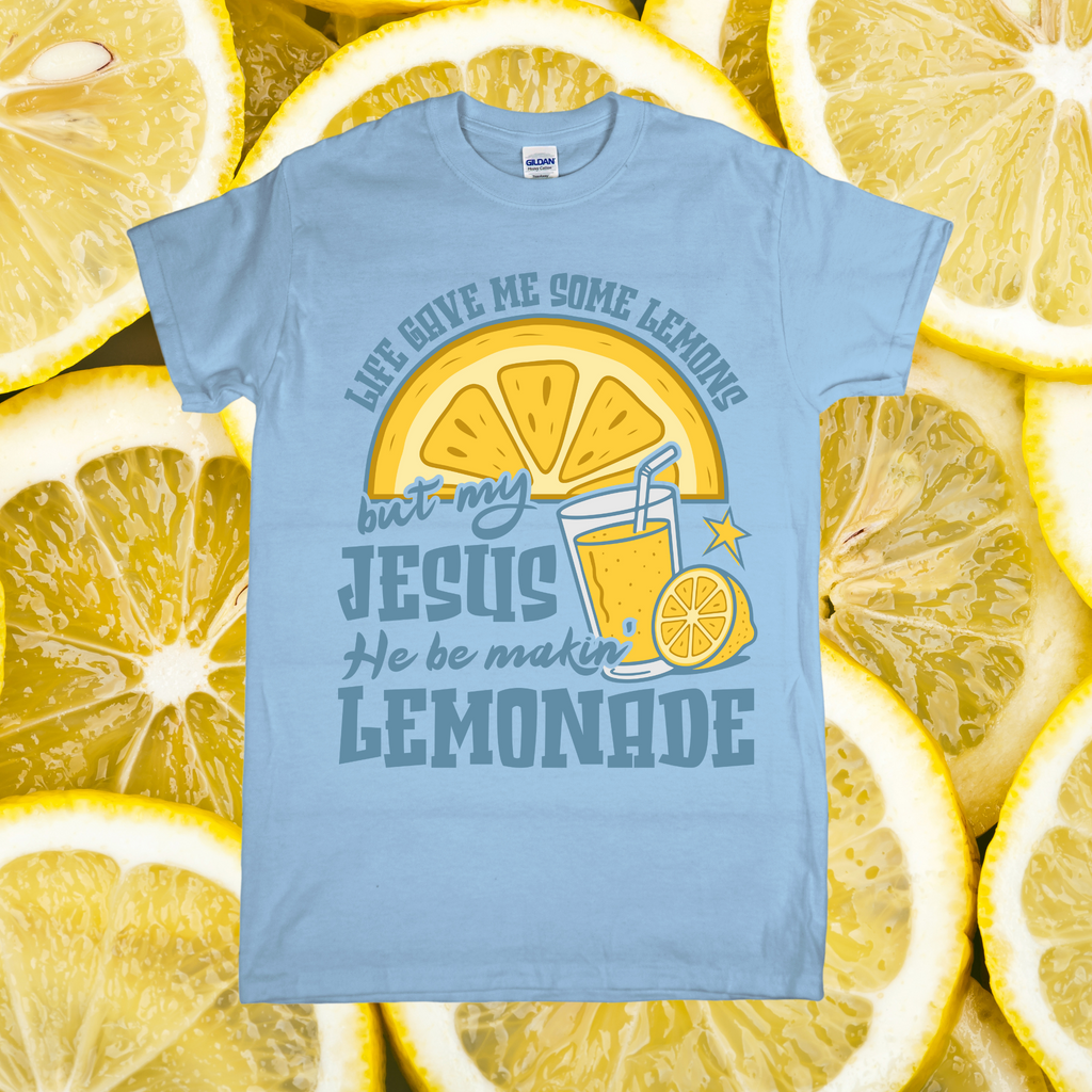 Light blue t-shirt with lemon-themed design on a background of lemon slices