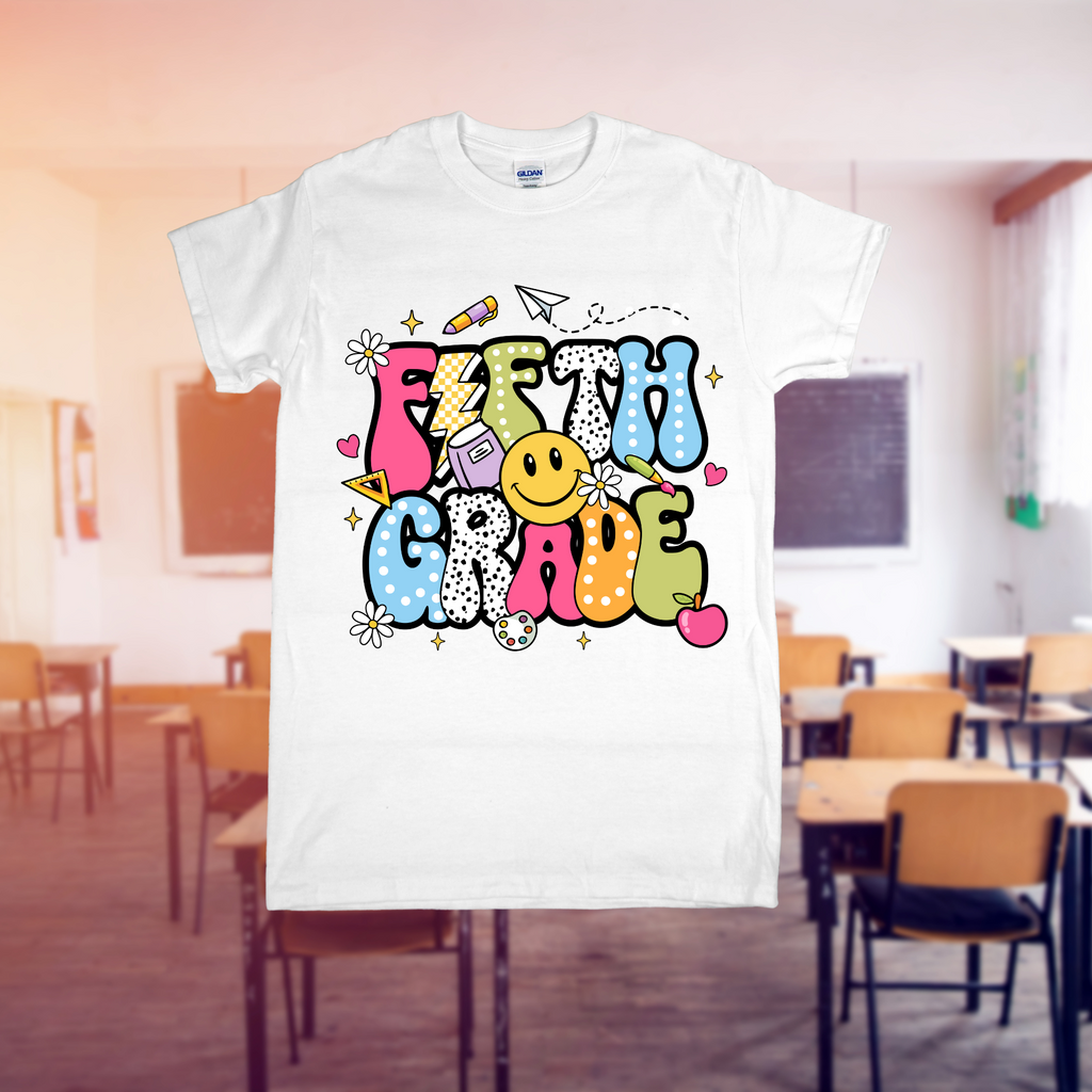 White t-shirt with colorful 'Fifth Grade' design in a classroom setting