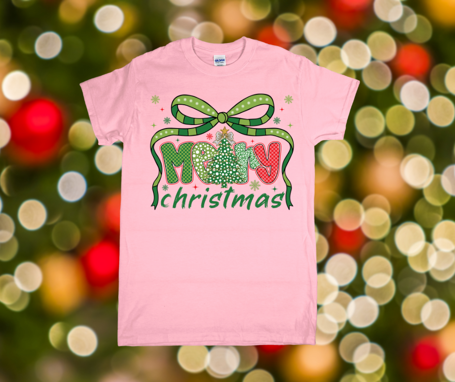Pink t-shirt with 'Merry Christmas' design on a festive background