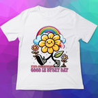 White t-shirt with a colorful flower and rainbow design on a geometric background