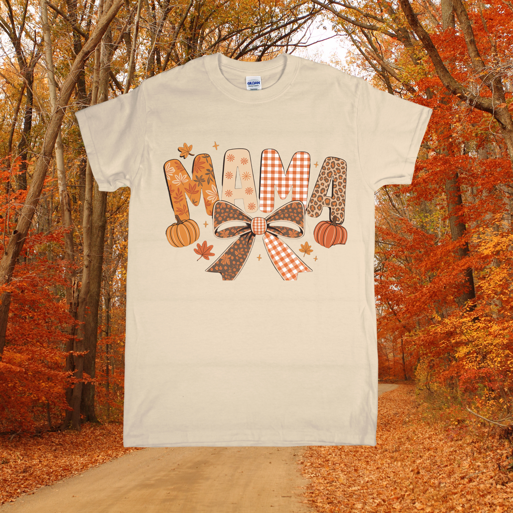 Beige t-shirt with 'MAMA' design in an autumn forest setting