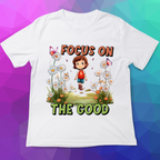 White t-shirt with a colorful graphic and 'Focus on the Good' text on a multicolored background