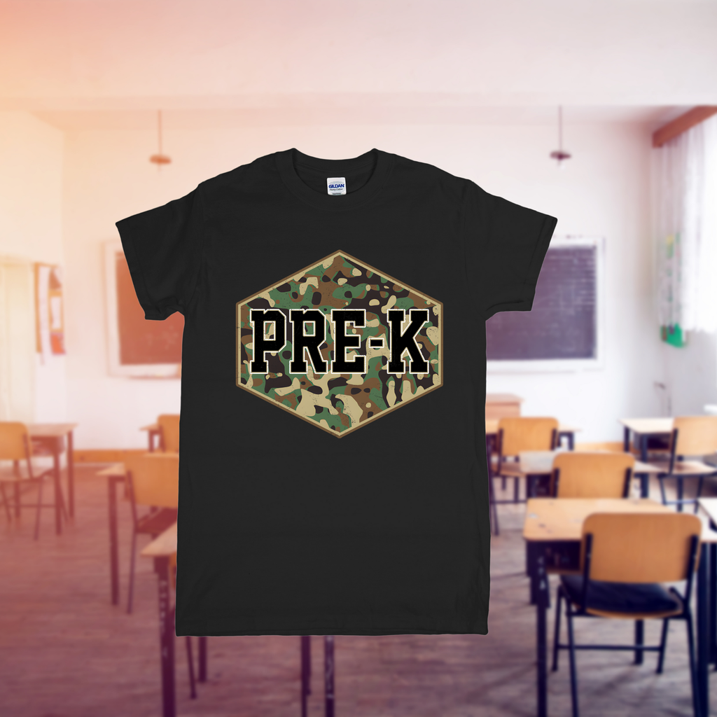 Black t-shirt with 'PRE-K' in a camouflage hexagon design on a classroom background
