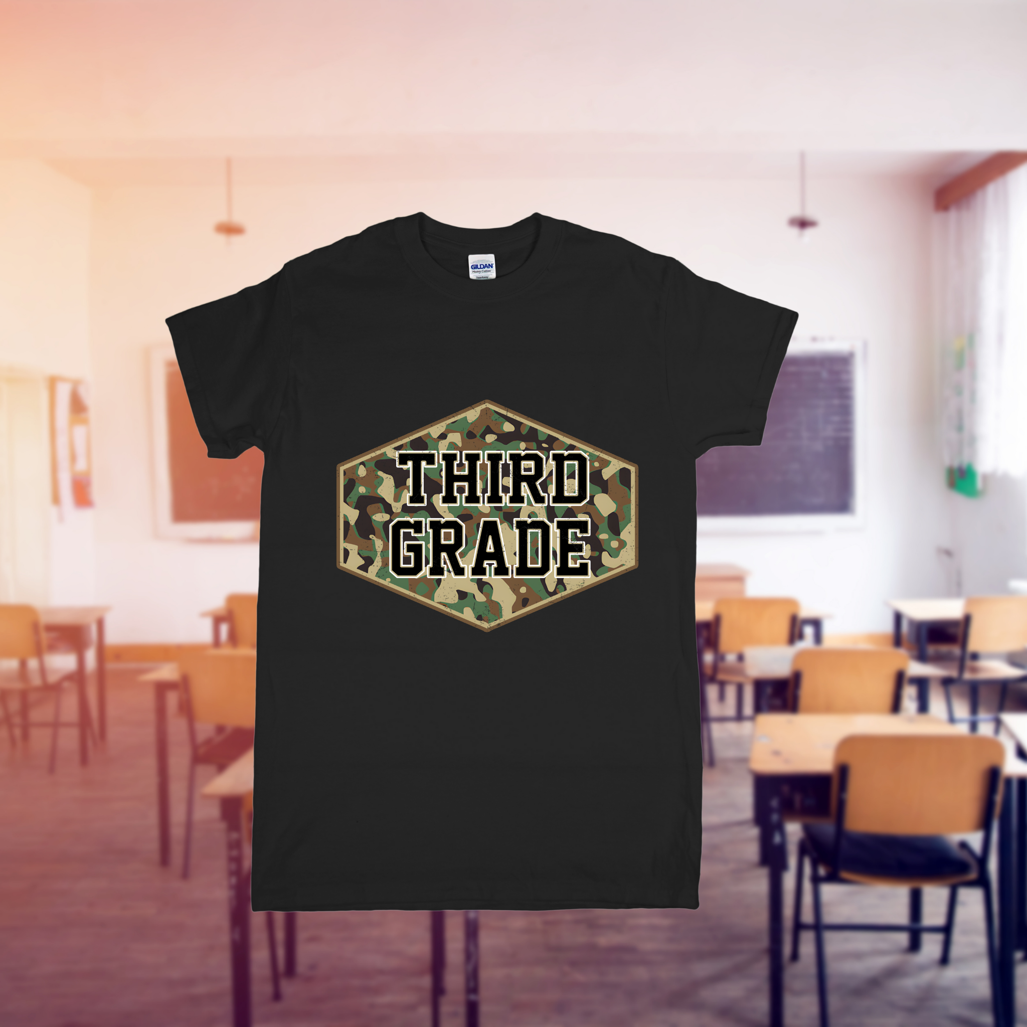Black t-shirt with 'THIRD GRADE' print in a classroom setting